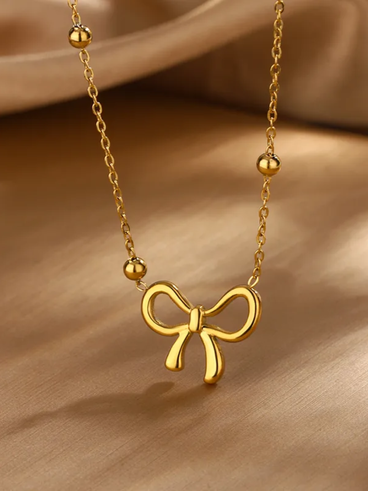 Gold-Plated Bow Pendant and Earring set