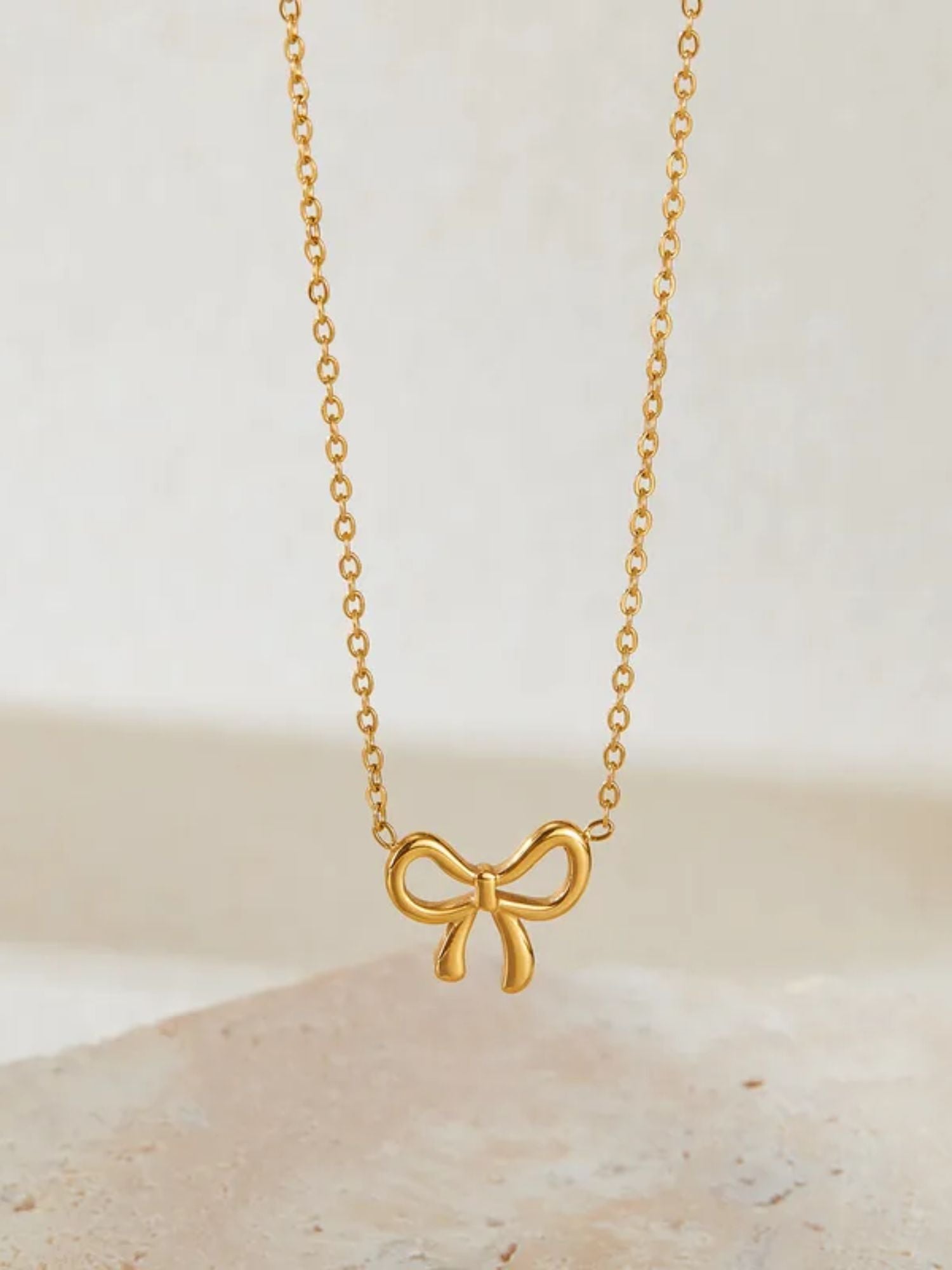 Gold Bow Pendant Necklace