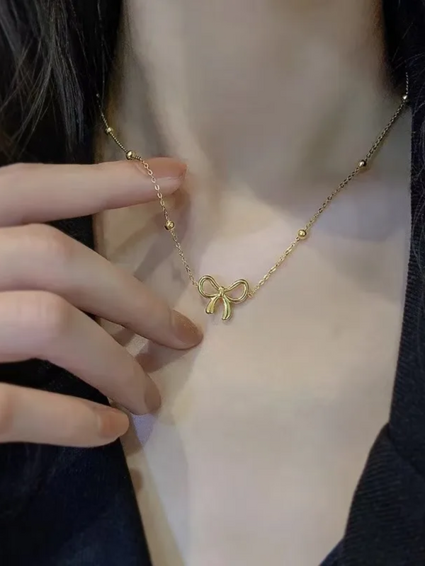 Gold-Plated Bow Pendant and Earring set