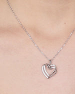 Load and play video in Gallery viewer, Silver Double Heart Pendant
